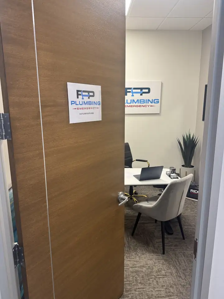 Open door of the FPP Plumbing office with the company sign, 3rd floor, Suite 300, at 5700 Tennyson Pkwy, Plano