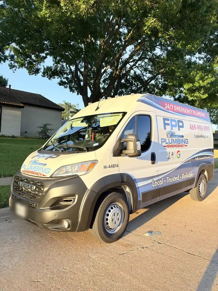 FPP Plumbing van parked at the curb of a residential street in Allen, 24/7 emergency plumbing and the Frisco number on its side