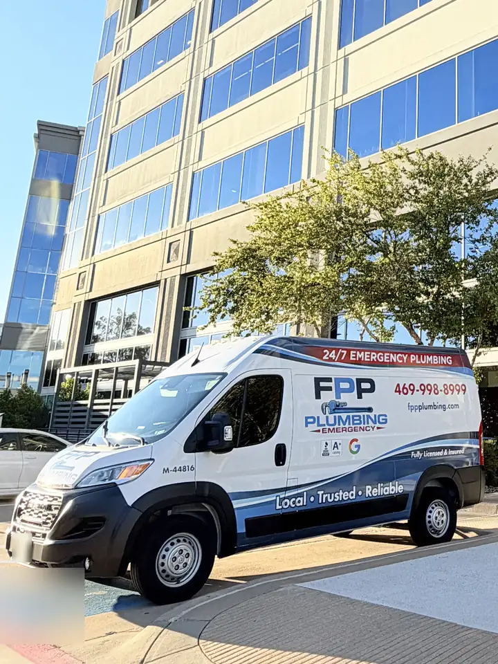 FPP Plumbing van parked at the entrance of our Plano office building at 5700 Tennyson Pkwy, Plano
