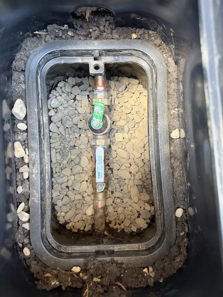 New secondary shutoff valve and PRV in a box with gravel for drainage, Frisco