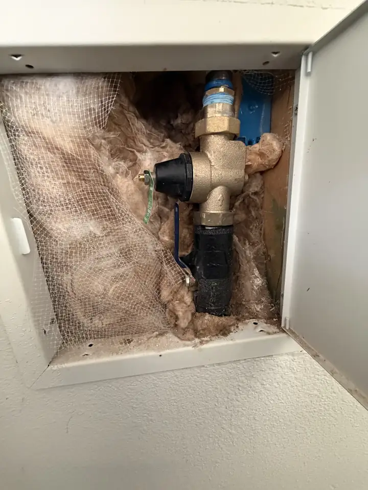 Replaced pressure reducing valve in a garage wall box, Frisco
