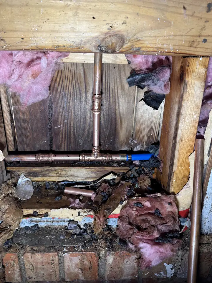 Replaced copper section in an open wall, water restored