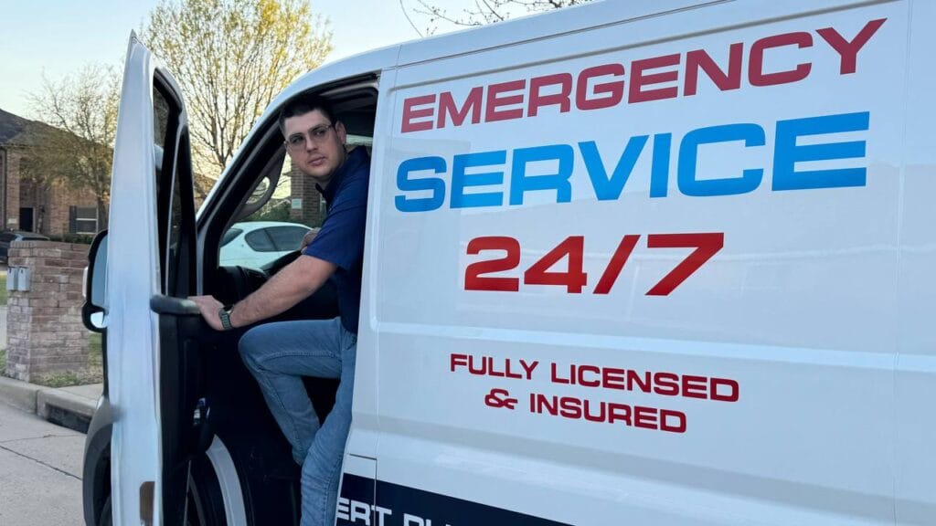 FPP Plumbing technician stepping out of branded truck during emergency plumbing call in Frisco