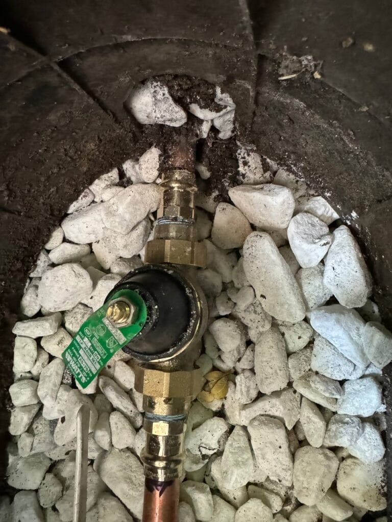 Newly installed PRV (Pressure Reducing Valve) outside home in Frisco after water pressure issue fixed